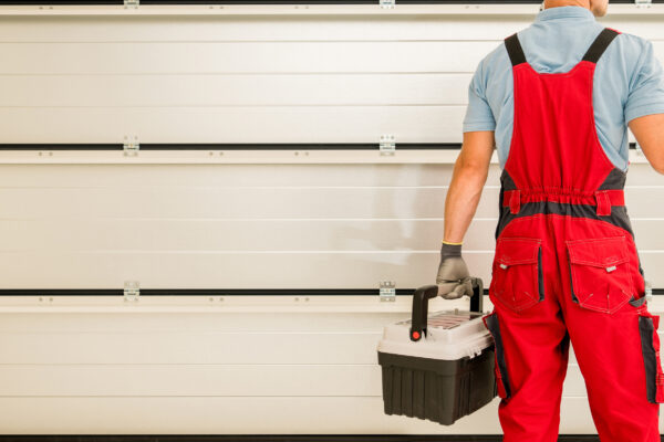 Garage Gate Installer Finishing His Job